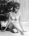 angela_douglas_christmas_tree_publicity_pose_legs-and_feet