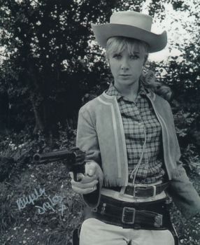 angela_douglas_pointing_pistol_in_carry_on_cowboy