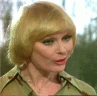 elke_sommer_in_carry_on_behind