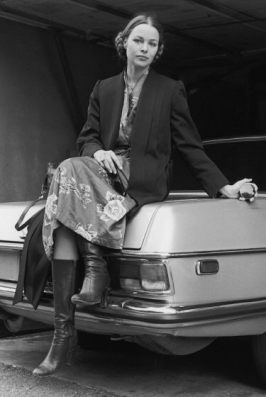 michelle_phillips_posing_on_car_boot_with_hair-tied_back_by_cynthia_mcadams