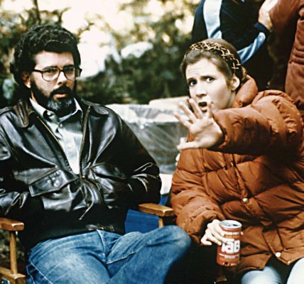 return_of_the_jedi_george_lucas_and_carrie_fisher_between_takes_on_location
