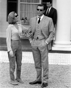 goldfinger_sean_connery_in_sunglasses_and_honor_blackman_on_location_between_takes_2