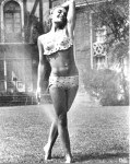 shirley_eaton_frolicking_in_water_from_a_sprinkler