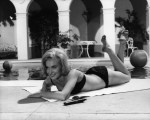 shirley_eaton_lying_face_forward_in_a_bikini_in_the_girl_hunters