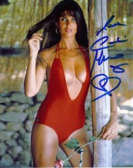 caroline_munro_posing_in_red_swimsuit