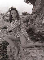 luciana_paluzzi_posing_on_a_rock