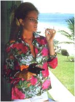 luciana_paluzzi_thunderball_floral_shirt_pistol_and_cigarette_2